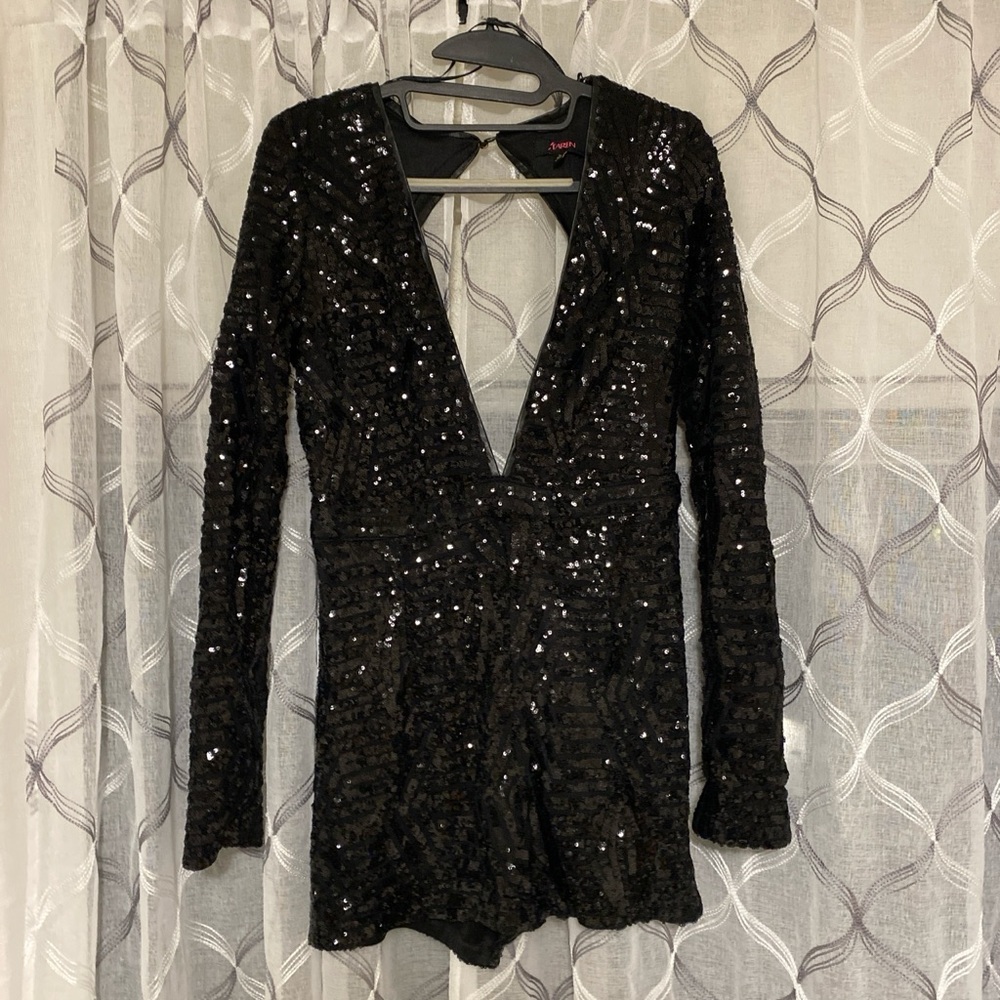 Large Black sequin romper with cutout front and long sleeves